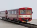 Roco 810 458-0 s přípojným vozem ČD, HO, analog