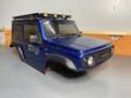 MST Suzuki Jimny J4 karosérie 1:10 WB 242mm